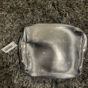 First aid beauty makeup bag